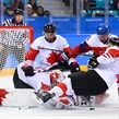 GANGNEUNG, SOUTH KOREA - FEBRUARY 24: Canada's Kevin Poulin #31, Chris Lee #4 and Mat Robinson #37 battle for the puck with Czech Republic's Jan Kovar #43 during bronze medal round action at the PyeongChang 2018 Olympic Winter Games. (Photo by Matt Zambonin/HHOF-IIHF Images)

